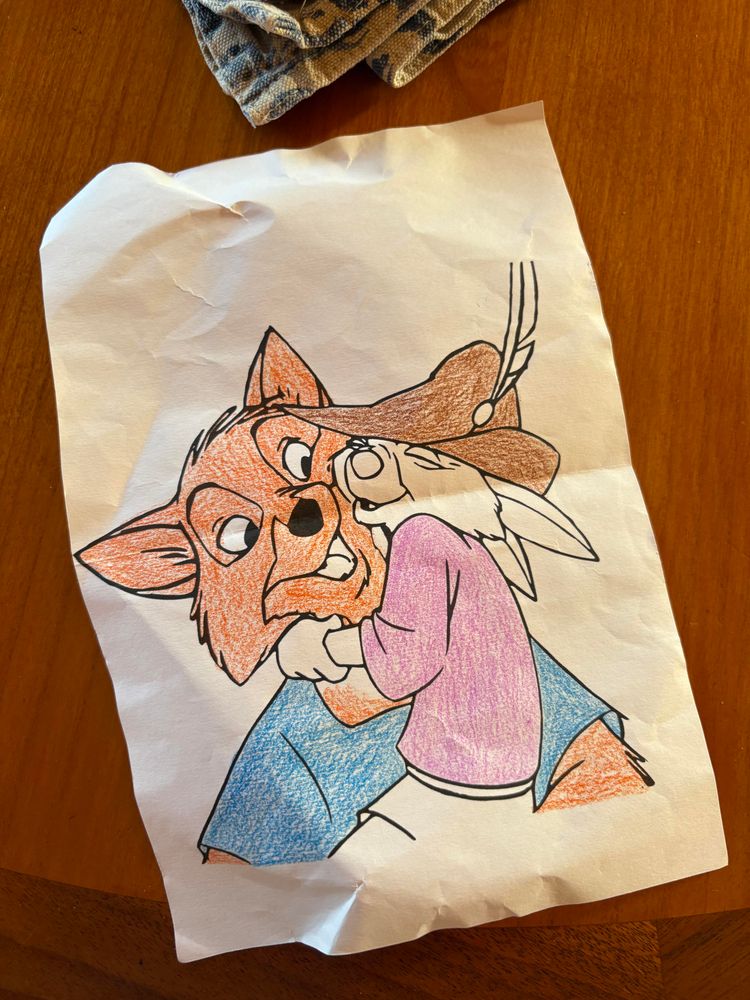 kid’s coloring of characters from the disney robin hood