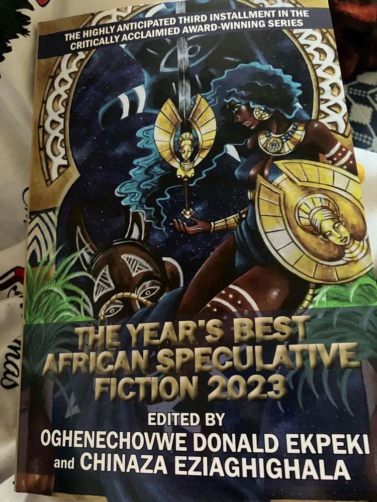 Photograph of a book cover  titled “ the years best African speculative fiction 2023” edited by Oghenechovwe Donald Ekpeki and Chinaza Eziaghighhala