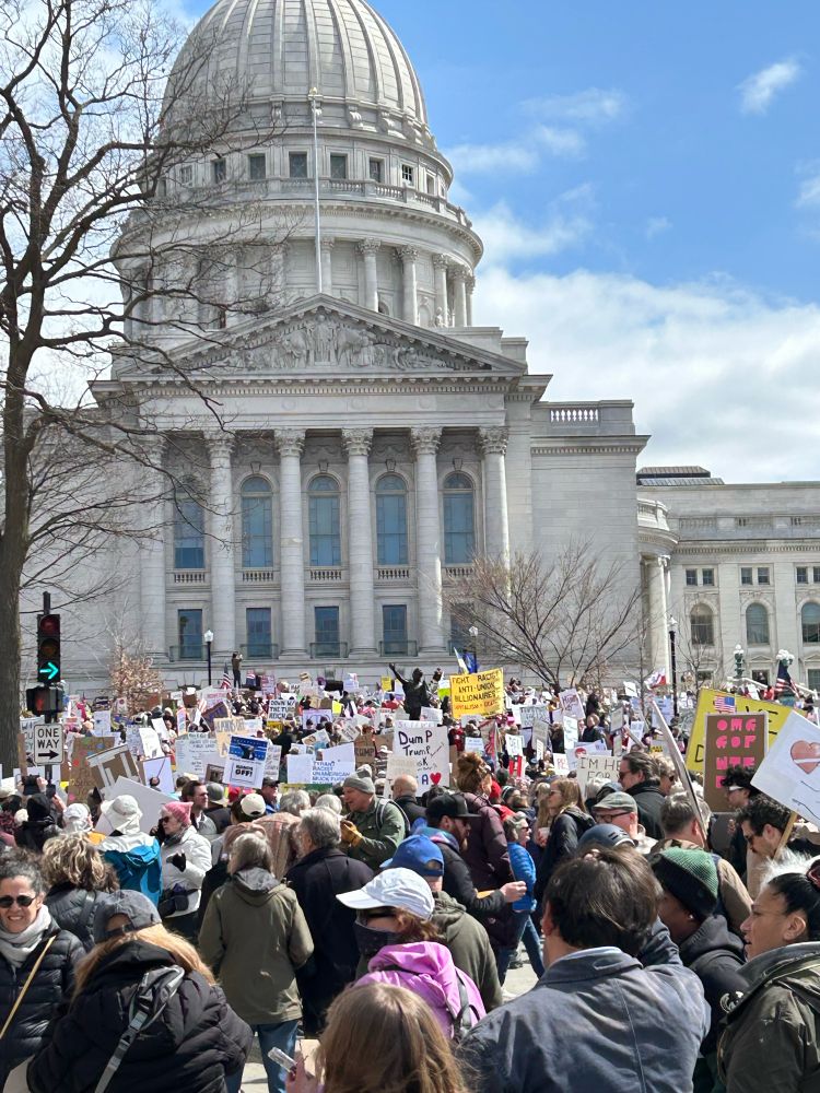 Crowds of protesters in front of the capitol building in Madison, WI