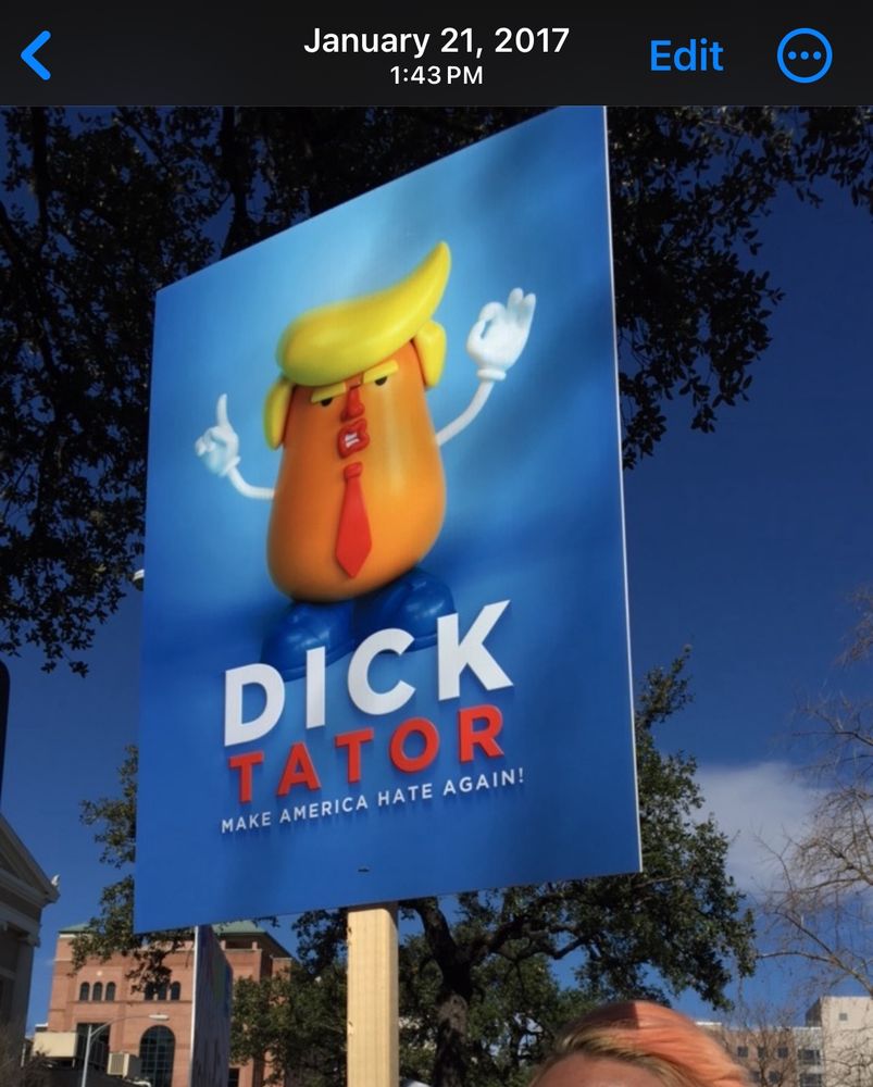 Sign from January 21, 2017 with a Mr potato head in a blond wig and red tie with the headline “Dick-Tator.”
