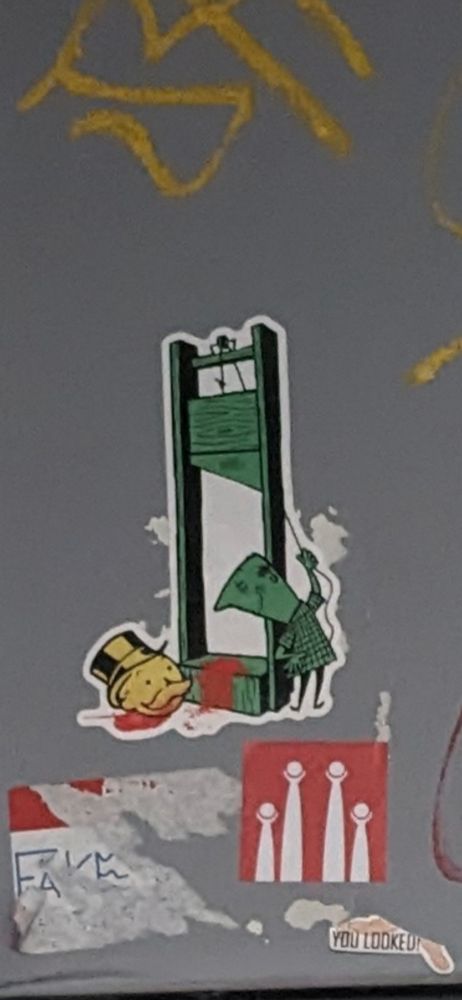 The Monopoly man's head has gone through the guillotine. 