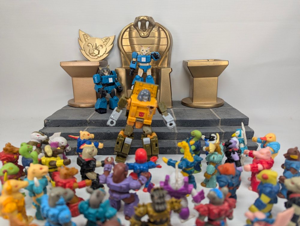 Leo the cat commanding an army of battle beasts to rip off brawns arms. 
