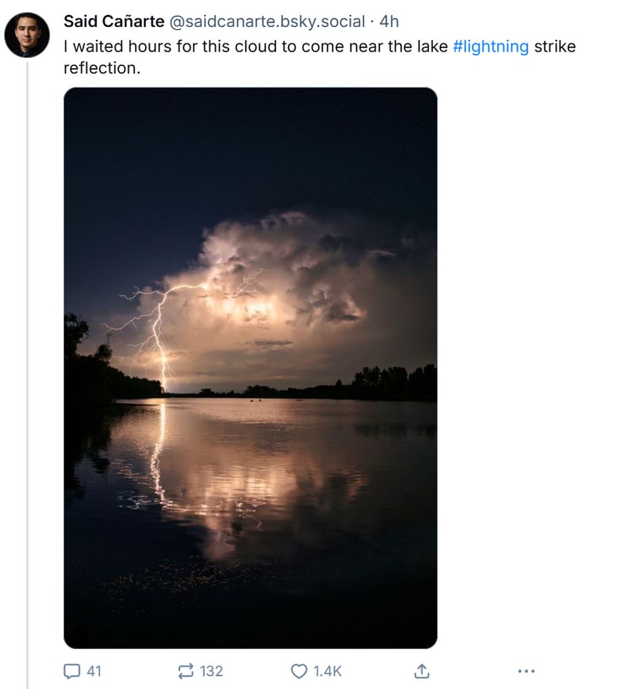 A pretty cool shot of a lake being struck by lightning that may or may not be AI generated but definitely is copypasta theft.