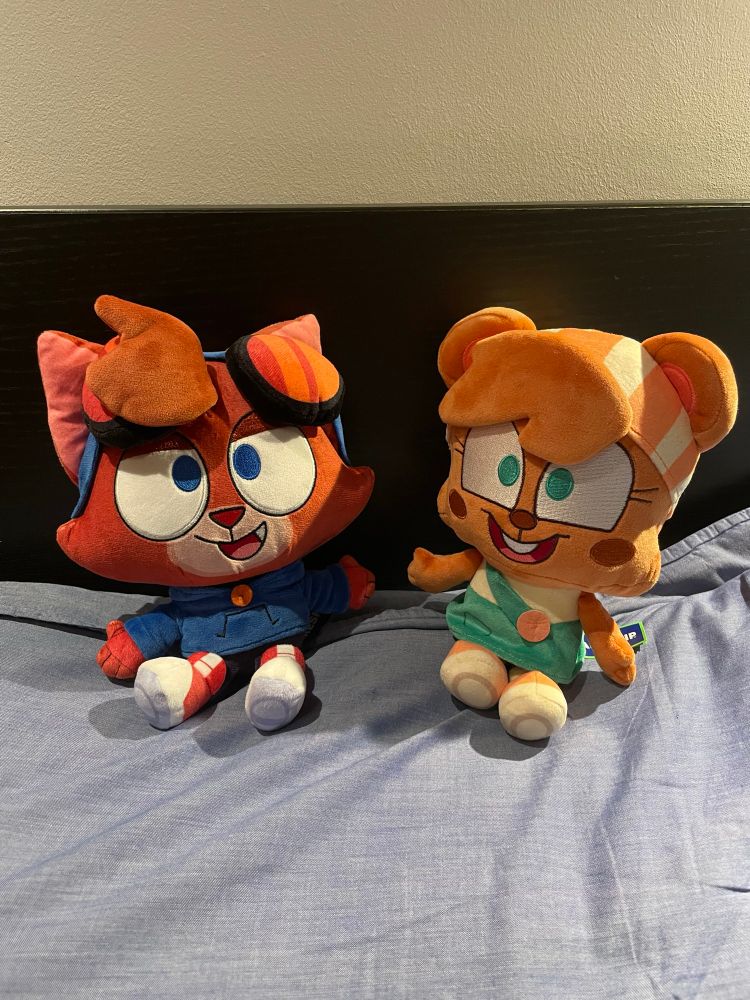 Plushies of Murphy and Mitzy