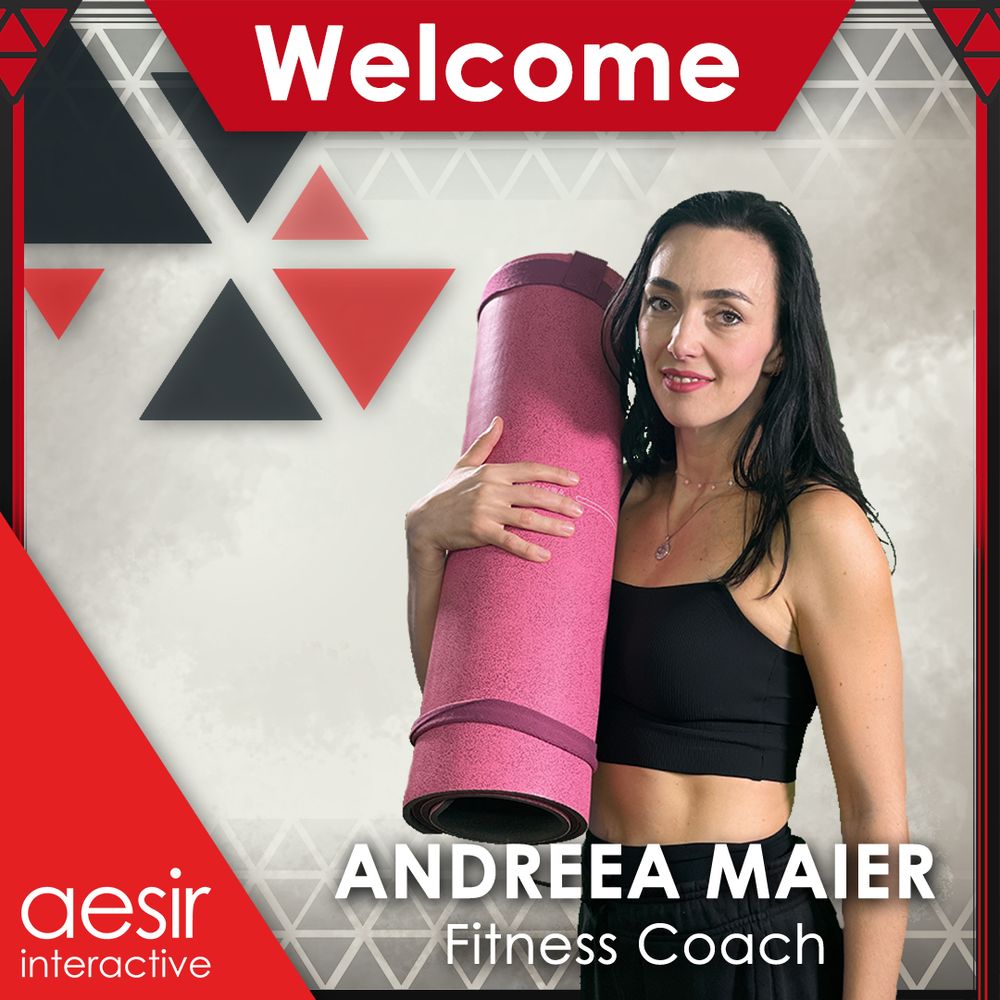 Image of an employee smiling into the camera, standing 45 degrees, and holding a yoga mat in her hands. They are surrounded by a graphic banner which says "Welcome", "Andreea Maier", "Fitness Coach", and "Aesir Interactive".