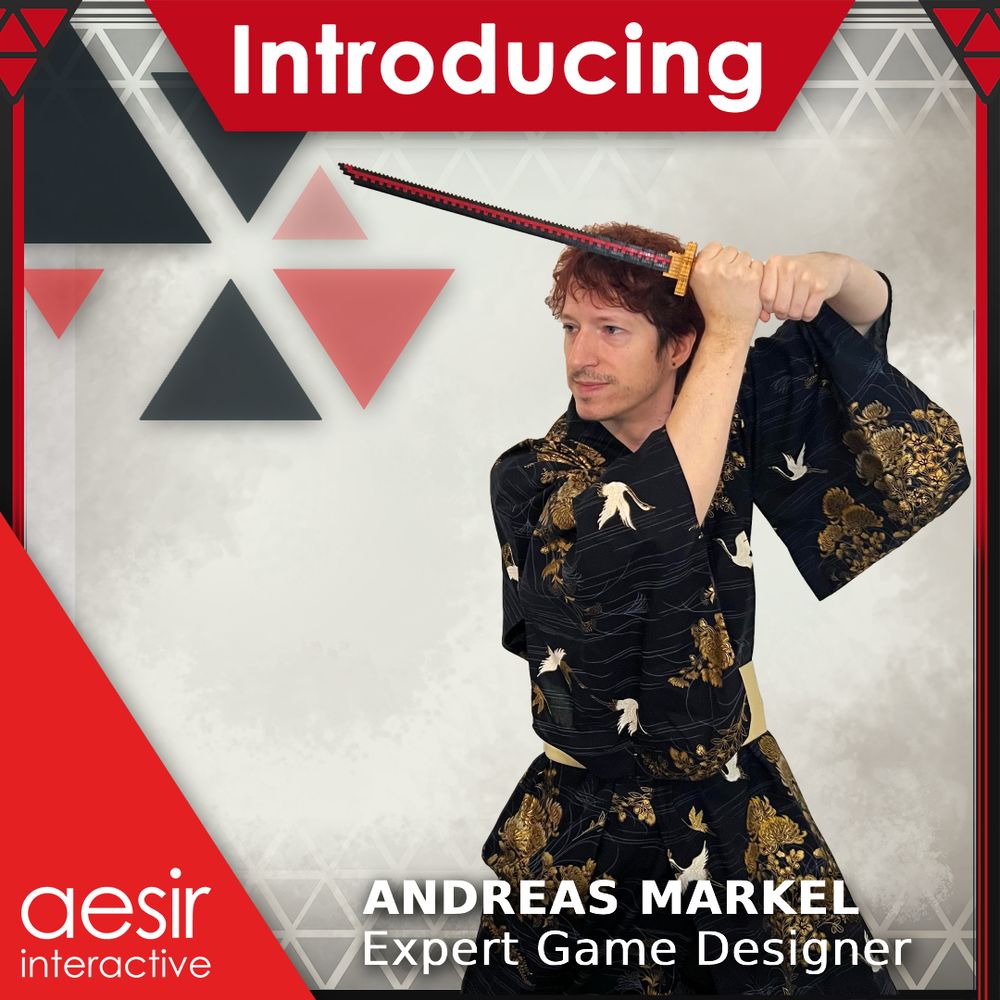 Aesir employee dressed in a black kimono and holding a toy katana in his both hands.