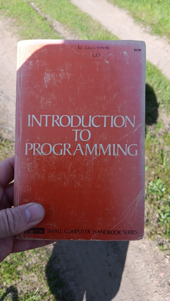 Picture of a book for programming the PDP8 minicomputer.