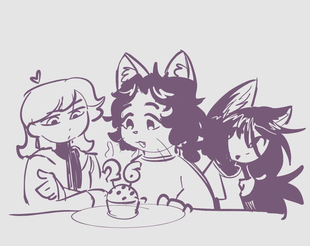 penni, nacha, and anna ae all looking at a birthday cupcake, 26 years!