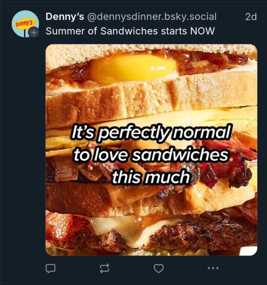 A photo of a Grand Slam sandwich with a text overlay saying it's perfectly normal to love sandwiches this much.
