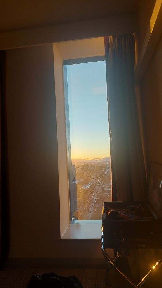 View of glasgow from the 17th floor of a hotel duringgolden hour