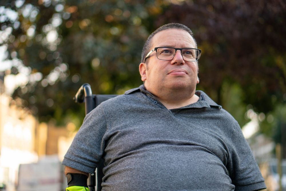 Older man outside in a wheelchair
