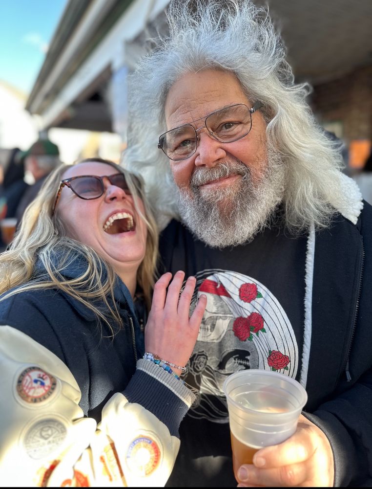me cackling with a man that slightly looks like jerry garcia