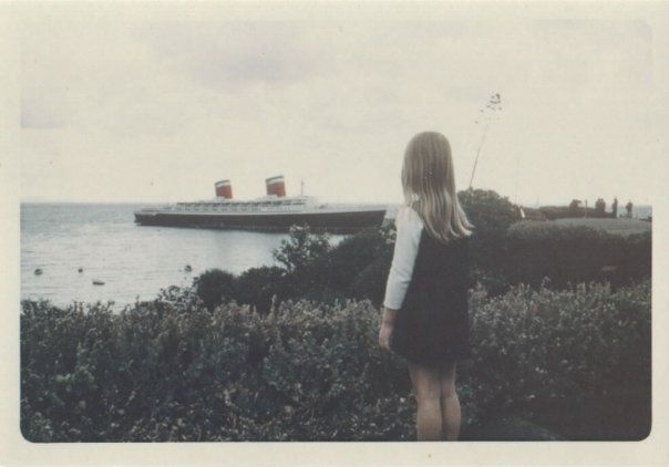 Holly Jahangiri as a child looking back at the S. S. United States in the distance.