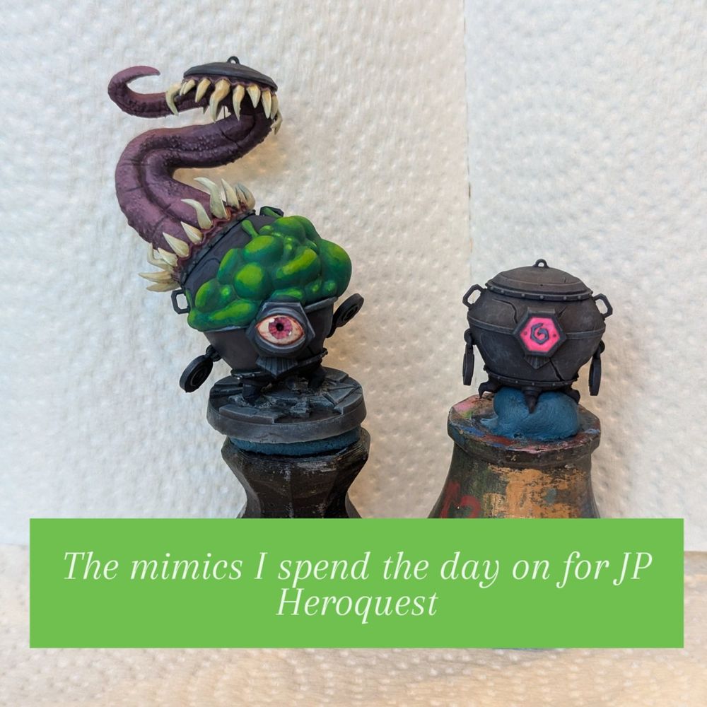 A mimic (a fantasy creature that disguises itself as ordinary objects) bursting from a closed cauldron. It has a large tongue and many teeth