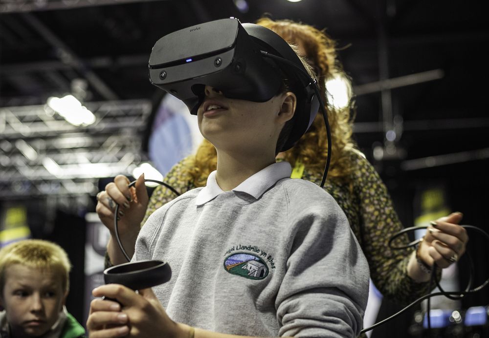 CC: Child using VR headset at an exhibition event.