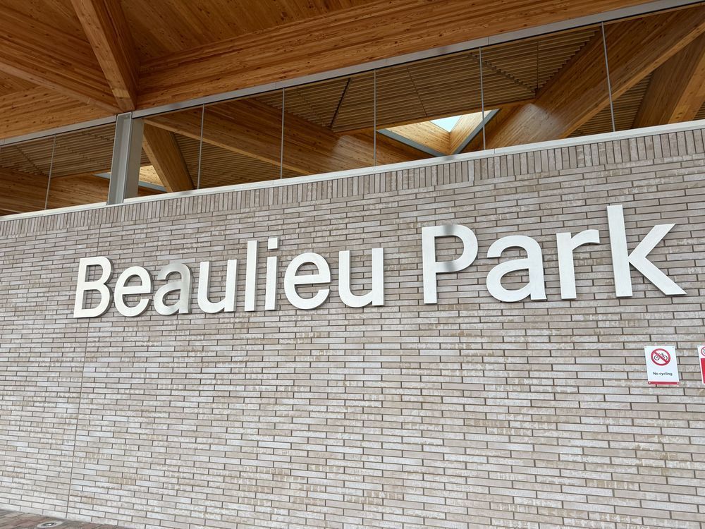 Large metallic Beaulieu Park text outside the station’s main entrance 