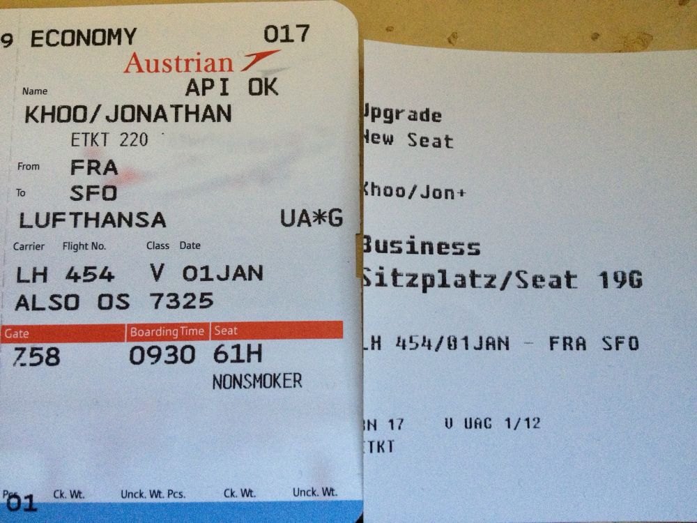 Boarding pass Frankfurt to San Francisco and an upgrade slip with new seat