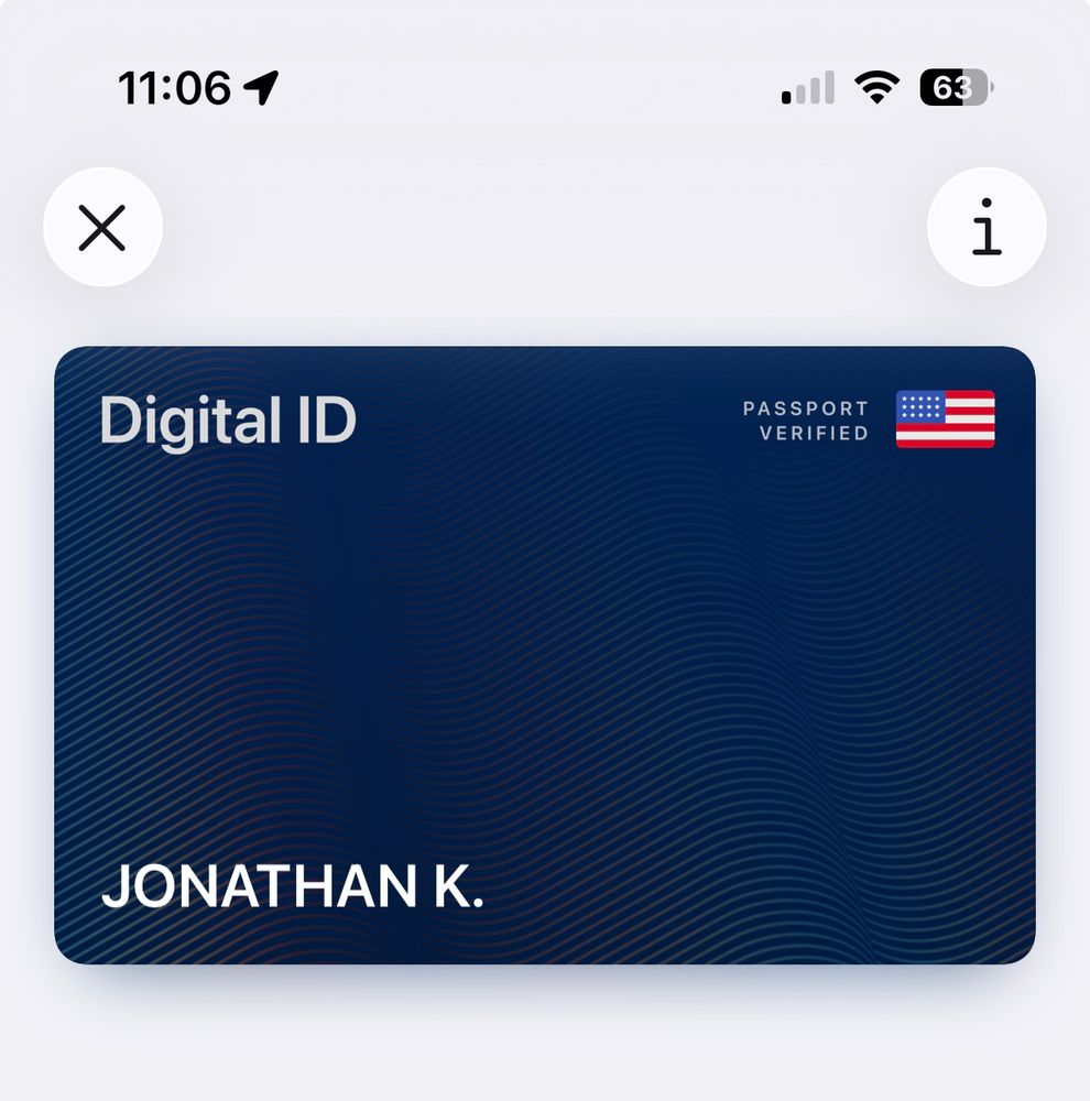 Picture of digital id card from apple wallet. (Plain, blue, says Digital ID and Passport Verified with US flag)