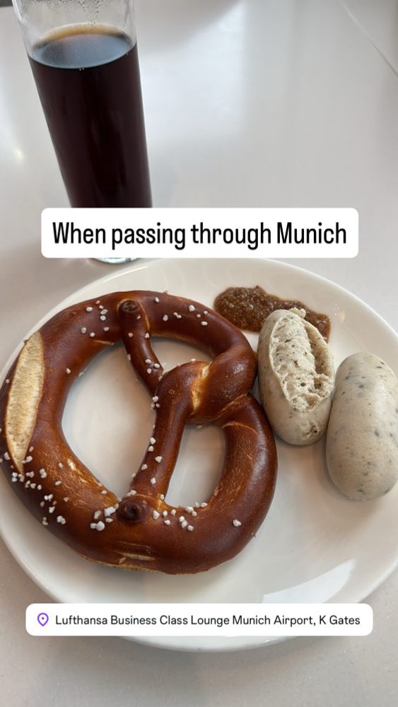 Photo of 2 weißwurst and a pretzel