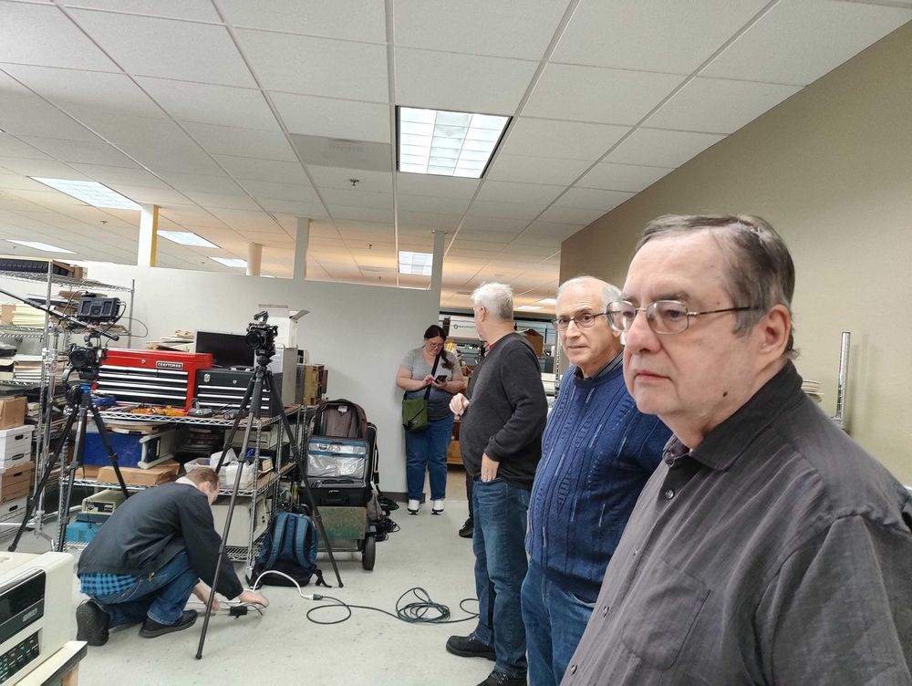 Several men (sorry, I don't know names, will try to add later) in the lab 