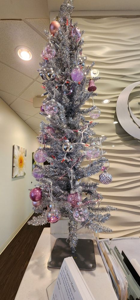 Silver trees with pink baubles to make you feel cheerful about scheduling your mammogram on Christmas eve.