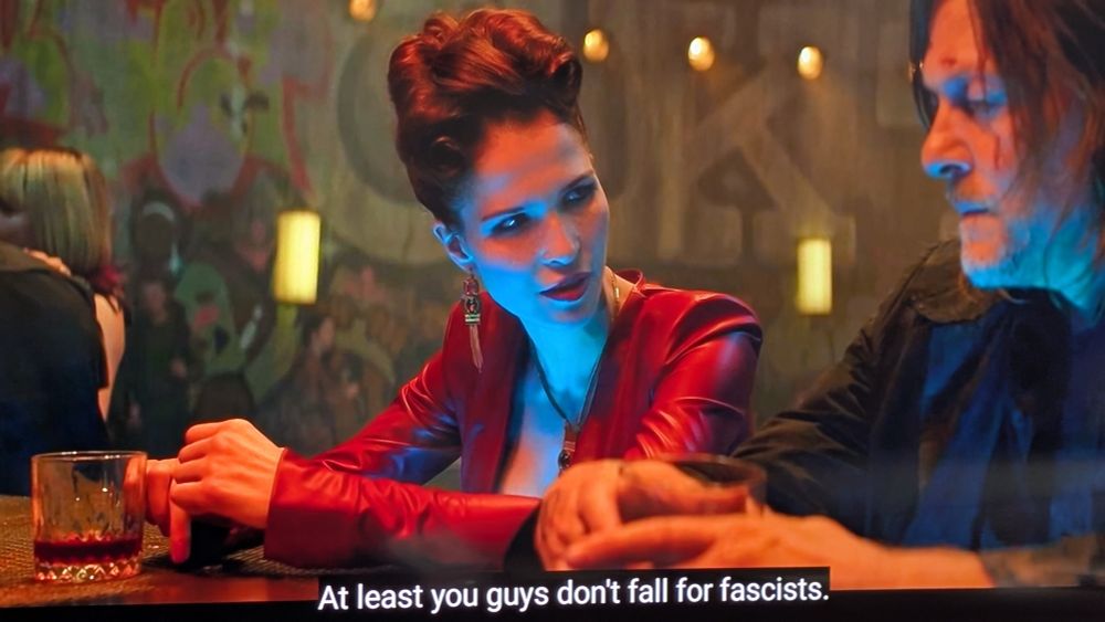 Screenshot from The Walking Dead: French lady saying "At least you guys don't fall for fascists" to Daryl Dixon (an American).