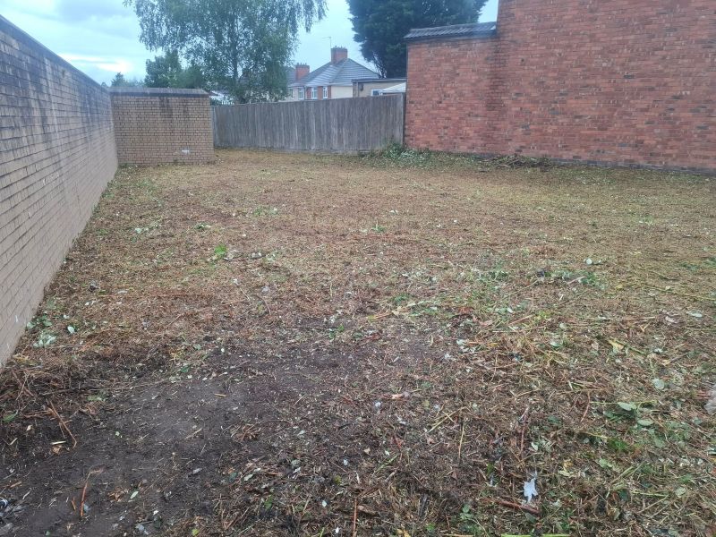 The same piece of land after clearing, ready to bring the ground back into use for a community garden in Stoke Heath, Coventry.