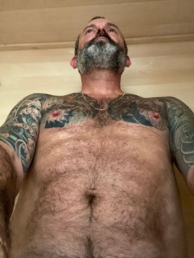 Sweaty tattoos torso