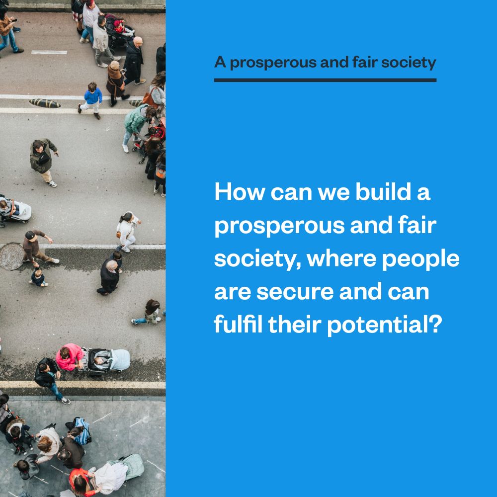 The same birdseye picture of people walking in the street flows into the left hand side. The text says 'A prosperous and fair society, how can we build a prosperous and fair society, where people are secure and can fulfil their potential?'.