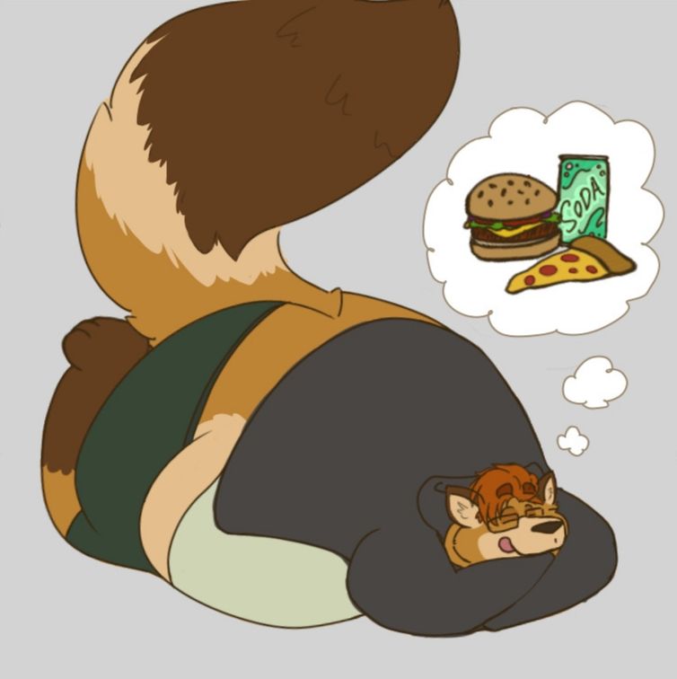 Big fat fox daydreaming about food while he's flopped onto his tummy