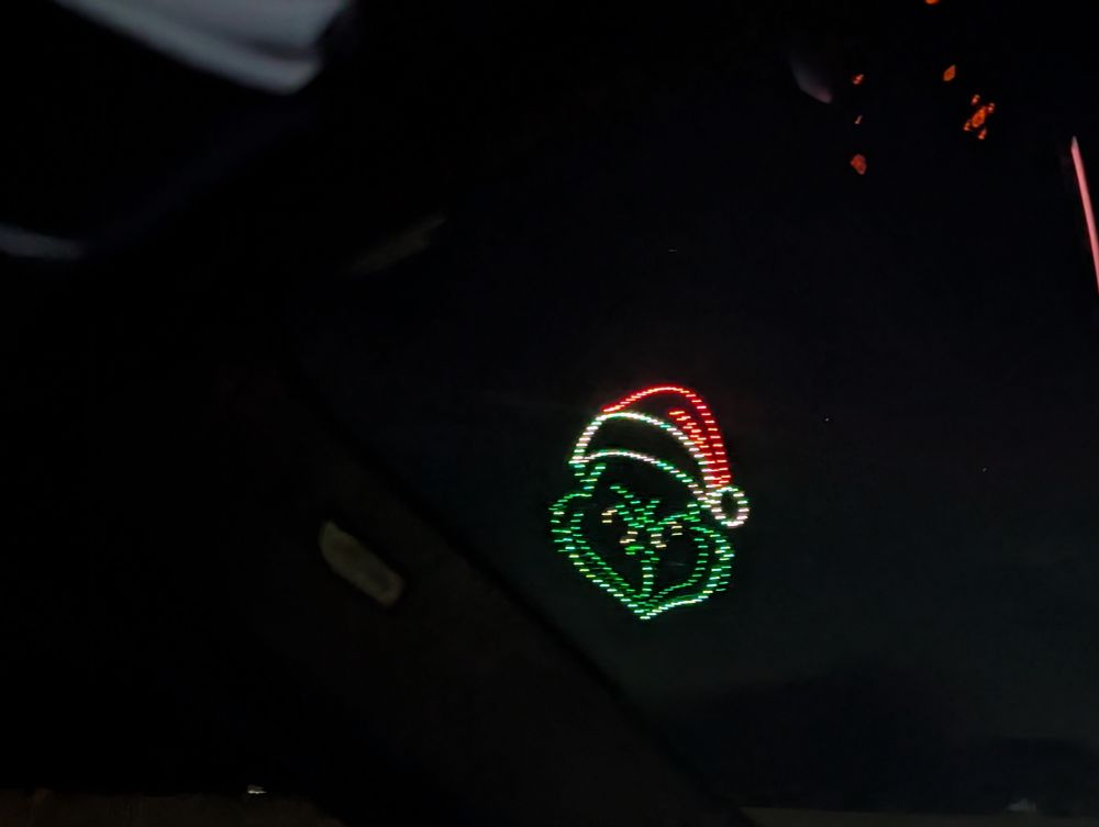 Large lit up Grinch in the sky