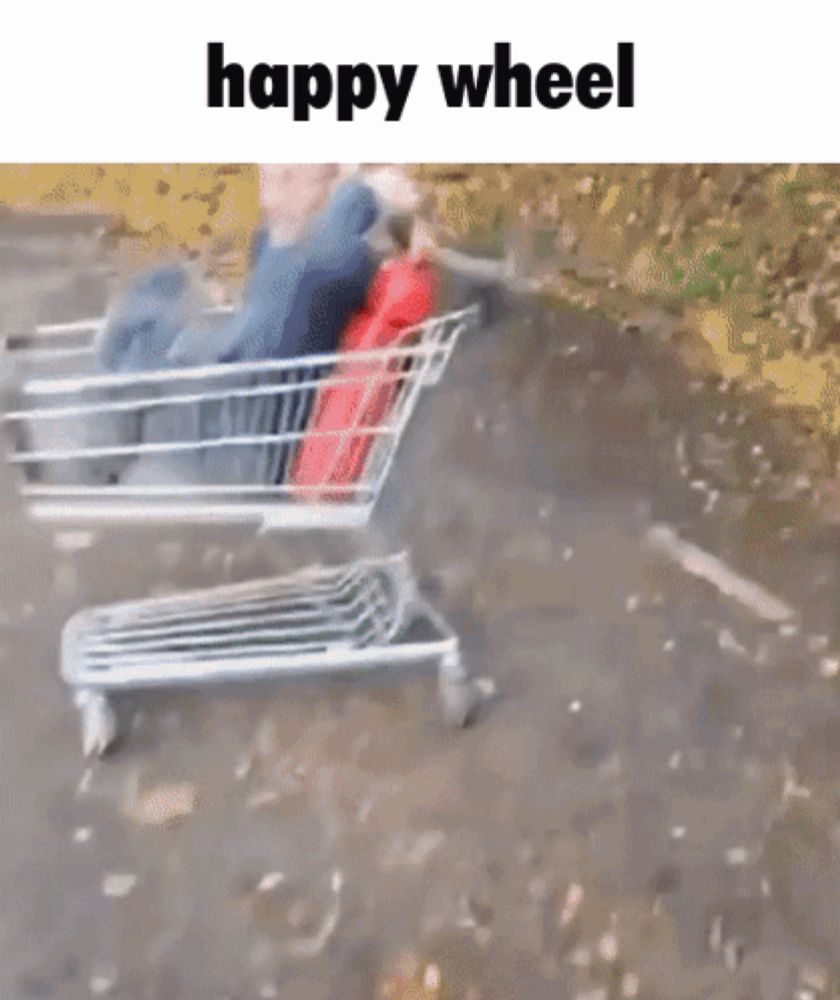 a person is sitting in a shopping cart that says happy wheel on it