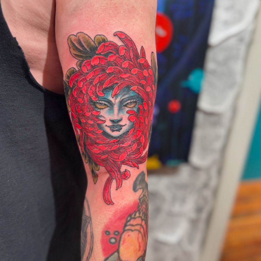 tattoo of a mum around a face 