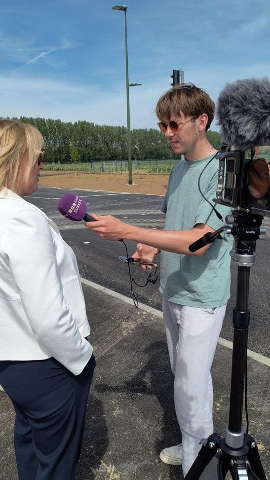 Cllr Joy Dennis being interviewed on site by a BBC Sussex Radio reporter
