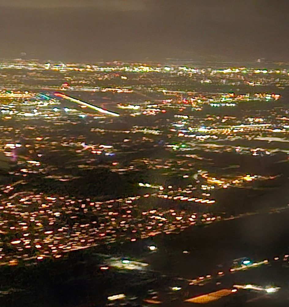 Amsterdam by night, from a delayed 737...