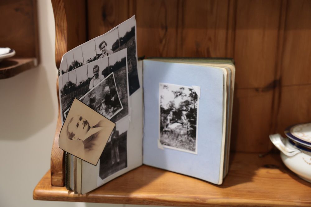 a photograph album of David Strain and his friends - part of an exhibition at the Ulster Museum