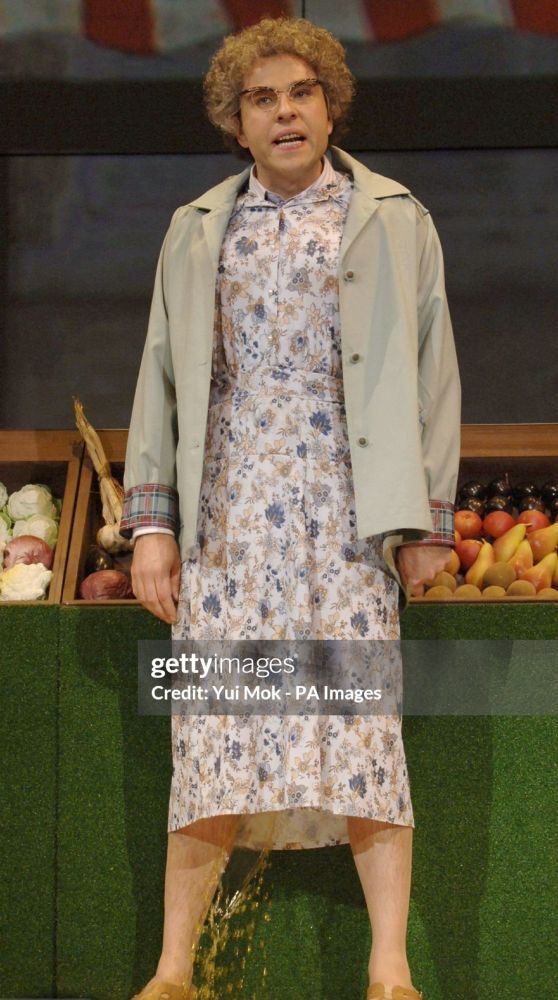 David Walliam in his Mrs Emery character, on stage having extreme incontinence.