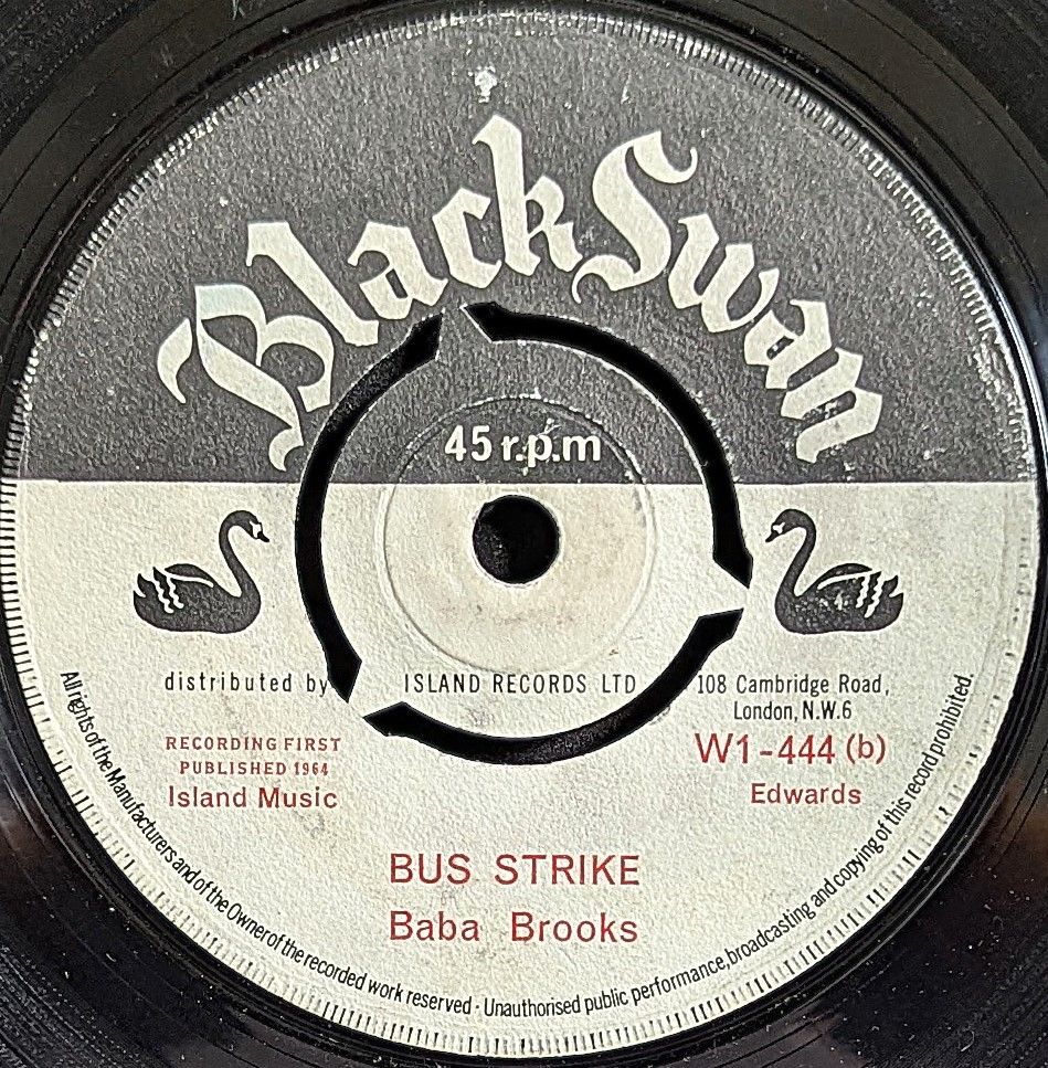 7" of Baba Brooks - Bus Strike on Black Swan label. Released in 1964. Produced by King Edwards.