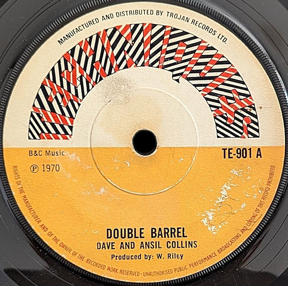7" of Dave And Ansel Collins - Double Barrel on Techniques label. Released in 1970. Produced by Winston Riley.