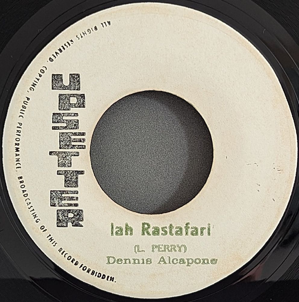 7" of Dennis Alcapone - Jah Rastafari on Upsetter label. Released in 1972. Produced by Lee Perry.