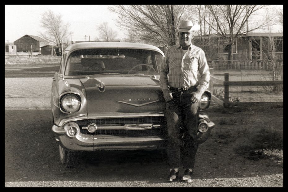 Rancher proudly showing off his new car.