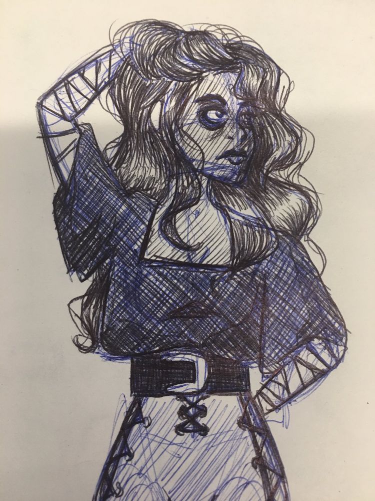 The same character as in the quoted tweet stands, right hand pulling back her voluminous wavy hair and left hand cleverly BEHIND, not on her hips. She wears the same pants laced up the sides with a chunky belt and a dark, oversized shirt with a square neckline. It is tucked into her pants. Her sleeves are rolled up and winched at the elbows. Her forearms (and hidden hands), are wrapped in bandages. 

