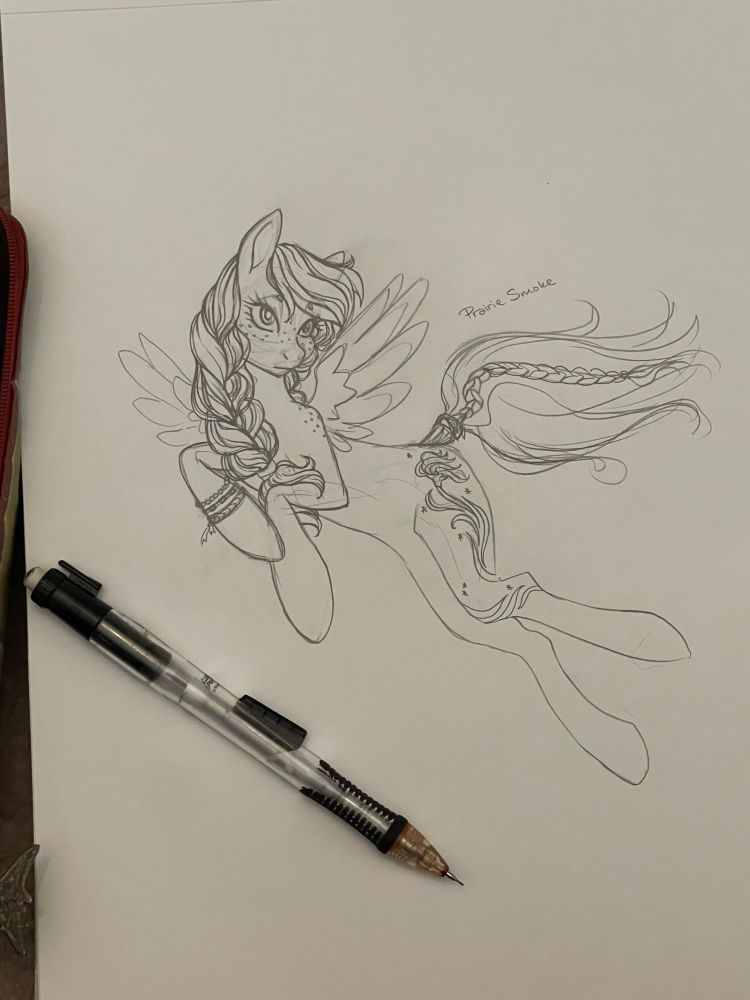 A pencil sketch of a pegasus pony with a braided mane and a free flowing tail with a single braid woven into it. She has three bracelets on her left foreleg, freckles on her face and withers, and her cutie mark is a swooping prairie smoke flower. A mechanical pencil lays on the page for size reference. 