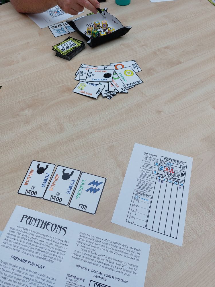 Pantheons game, showing rules, score sheet, cards and dice.