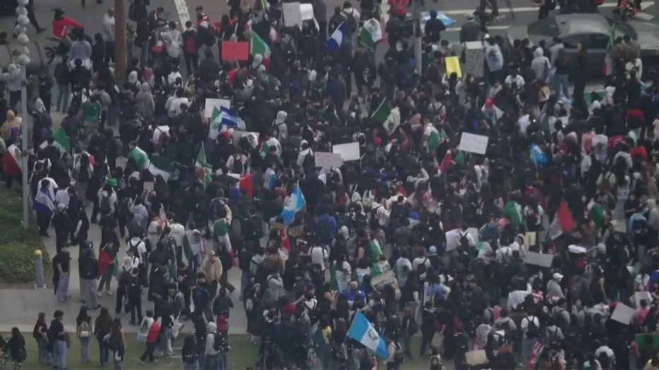 Wide shot of mass crowd of school walkout in Los Angeles, CA.