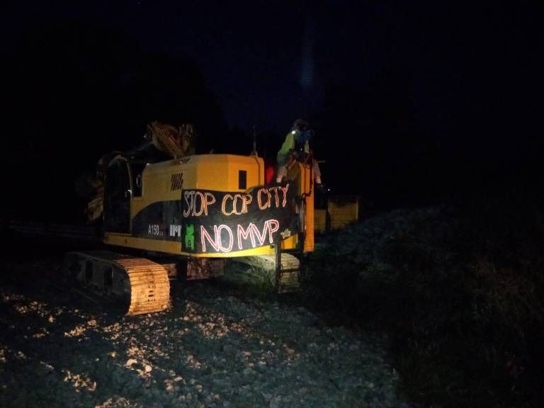 Anti-pipeline lockdown in solidarity with Cop City protesters in Virginia.