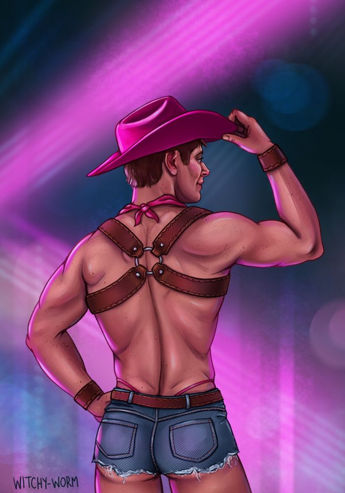Dean Winchester is standing with his back to the camera, one hand on his hip and one hand tipping his hat. He’s dressed in tiny cutoff jean shorts with visible thong straps, a leather harness, matching leather cuffs, a pink bandana around his neck and pink cowboy hat