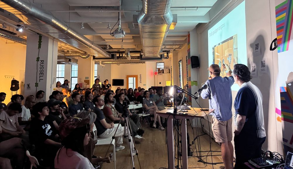 A shot of the crowd at the Recurse Center's Brooklyn hub. About 95 people are watching the talk.