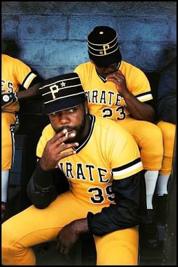 Dave Parker looking cool as shit smoking a cig in the dugout