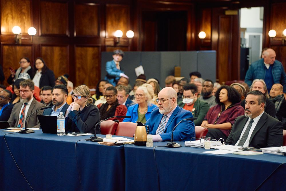 Community members testify at a Committee on Housing and Buildings hearing in Council Chambers.